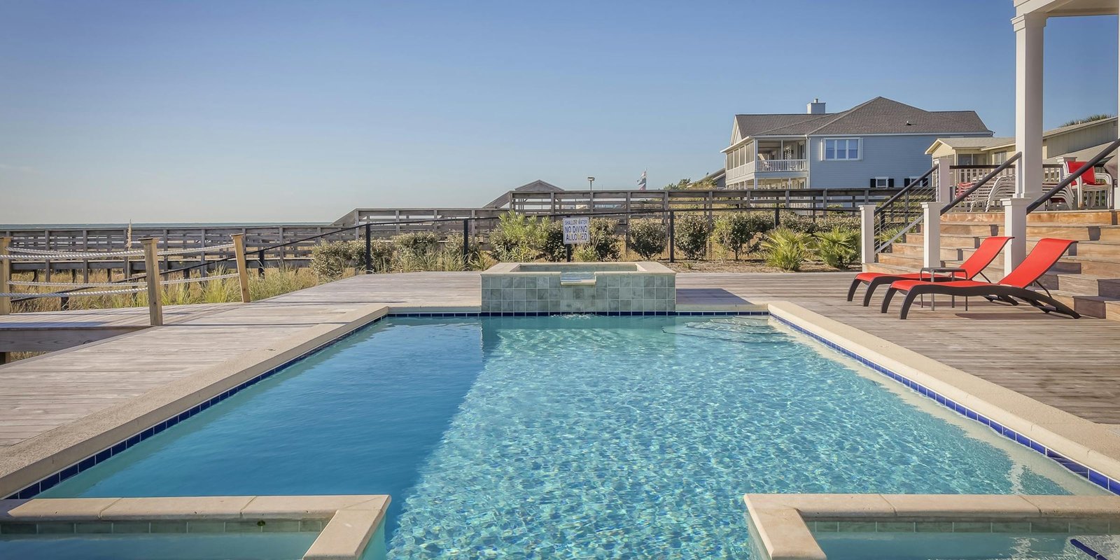Licensed electrician in North Jersey performing pool electrical installation with underwater LED lighting